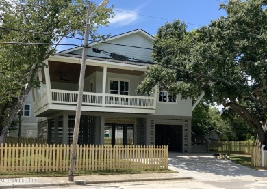 You know that one house that just feels like a coastal getaway on Pass Christian Isles Golf Club in Mississippi - for sale on GolfHomes.com, golf home, golf lot