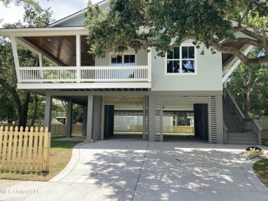 You know that one house that just feels like a coastal getaway on Pass Christian Isles Golf Club in Mississippi - for sale on GolfHomes.com, golf home, golf lot