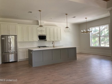 You know that one house that just feels like a coastal getaway on Pass Christian Isles Golf Club in Mississippi - for sale on GolfHomes.com, golf home, golf lot