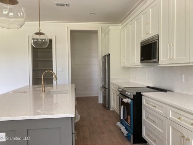 You know that one house that just feels like a coastal getaway on Pass Christian Isles Golf Club in Mississippi - for sale on GolfHomes.com, golf home, golf lot