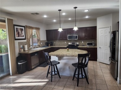 Step into this 2,891 sq ft residence, ideally located on a quiet on Rhodes Ranch Golf Club in Nevada - for sale on GolfHomes.com, golf home, golf lot