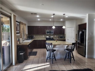 Step into this 2,891 sq ft residence, ideally located on a quiet on Rhodes Ranch Golf Club in Nevada - for sale on GolfHomes.com, golf home, golf lot