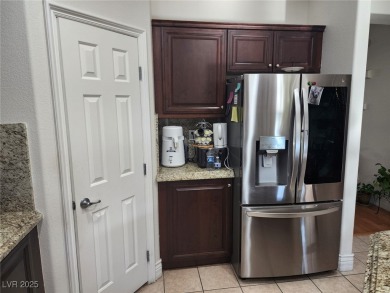 Step into this 2,891 sq ft residence, ideally located on a quiet on Rhodes Ranch Golf Club in Nevada - for sale on GolfHomes.com, golf home, golf lot