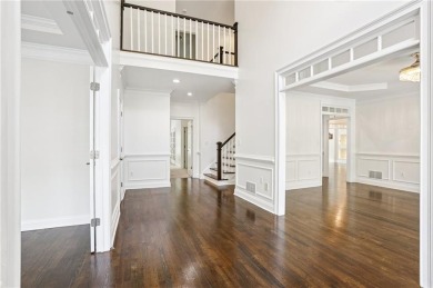 Discover an extraordinary 8,999 square foot sanctuary perfect on Brookstone Golf and Country Club in Georgia - for sale on GolfHomes.com, golf home, golf lot