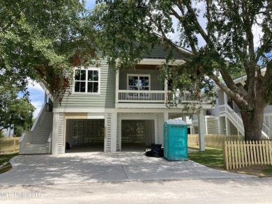 Sun, sand, and your own modern treehouse in Pass Christian? Yes on Pass Christian Isles Golf Club in Mississippi - for sale on GolfHomes.com, golf home, golf lot