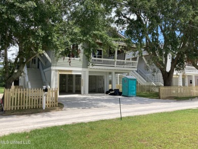 Sun, sand, and your own modern treehouse in Pass Christian? Yes on Pass Christian Isles Golf Club in Mississippi - for sale on GolfHomes.com, golf home, golf lot