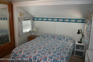 Spacious 1998 nomad park model, 584 square feet. Large living on Star Valley RV Golf Course in Wyoming - for sale on GolfHomes.com, golf home, golf lot
