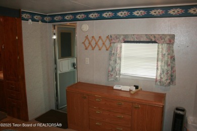 Spacious 1998 nomad park model, 584 square feet. Large living on Star Valley RV Golf Course in Wyoming - for sale on GolfHomes.com, golf home, golf lot