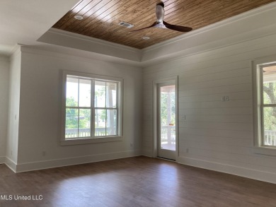 Sun, sand, and your own modern treehouse in Pass Christian? Yes on Pass Christian Isles Golf Club in Mississippi - for sale on GolfHomes.com, golf home, golf lot
