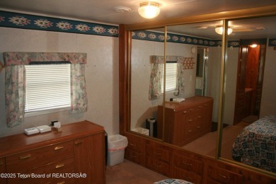 Spacious 1998 nomad park model, 584 square feet. Large living on Star Valley RV Golf Course in Wyoming - for sale on GolfHomes.com, golf home, golf lot