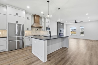 Discover this in pristine, move-in-ready condition, 2024-built on Big Sugar Golf Club in Arkansas - for sale on GolfHomes.com, golf home, golf lot