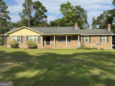 Check out this amazing brick home located near Forest Heights on Forest Heights Country Club in Georgia - for sale on GolfHomes.com, golf home, golf lot