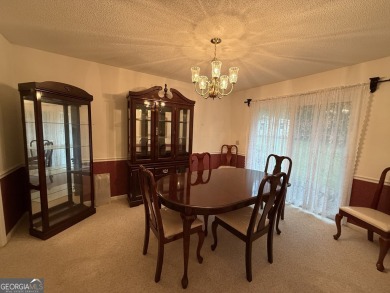 Check out this amazing brick home located near Forest Heights on Forest Heights Country Club in Georgia - for sale on GolfHomes.com, golf home, golf lot