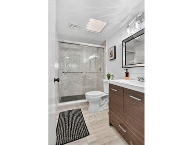 This Updated 55+,1300 SQFT. 2/2 Condo with updated kitchen on Boca Dunes Golf and Country Club in Florida - for sale on GolfHomes.com, golf home, golf lot