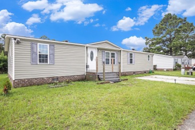 Beautiful 3 bedroom, 2 bath home centrally located in Myrtle on Whispering Pines in South Carolina - for sale on GolfHomes.com, golf home, golf lot