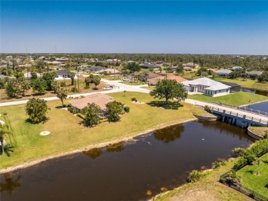 Under contract-accepting backup offers. DOUBLE WATERFRONT LOT on Rotonda Golf and Country Club - Long Marsh  in Florida - for sale on GolfHomes.com, golf home, golf lot
