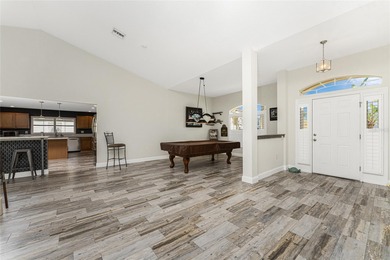 Impressive and spacious  4 Bedroom, 3 Bathroom home with on Kingsway Country Club in Florida - for sale on GolfHomes.com, golf home, golf lot