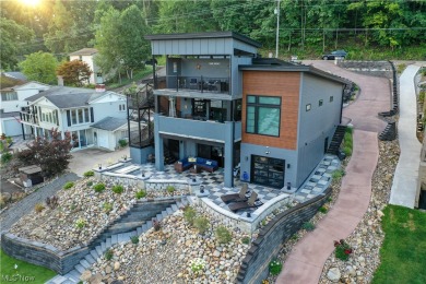 ONE OF A KIND custom-built (2021) modern dream home with on Lake Mohawk Golf Club in Ohio - for sale on GolfHomes.com, golf home, golf lot