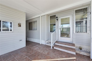 Enjoy relaxed Florida living in this 1978 home nestled inside a on Maple Leaf Golf and Country Club in Florida - for sale on GolfHomes.com, golf home, golf lot