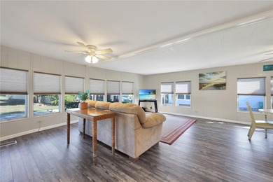 Enjoy relaxed Florida living in this 1978 home nestled inside a on Maple Leaf Golf and Country Club in Florida - for sale on GolfHomes.com, golf home, golf lot