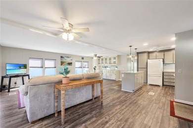 Enjoy relaxed Florida living in this 1978 home nestled inside a on Maple Leaf Golf and Country Club in Florida - for sale on GolfHomes.com, golf home, golf lot