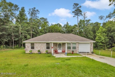 This 3 bed, 2 bath home built in 2023 is just a baby which means on Diamondhead Country Club in Mississippi - for sale on GolfHomes.com, golf home, golf lot