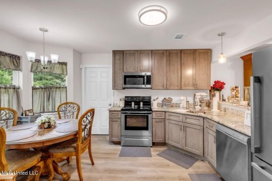 This 3 bed, 2 bath home built in 2023 is just a baby which means on Diamondhead Country Club in Mississippi - for sale on GolfHomes.com, golf home, golf lot