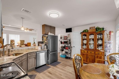This 3 bed, 2 bath home built in 2023 is just a baby which means on Diamondhead Country Club in Mississippi - for sale on GolfHomes.com, golf home, golf lot