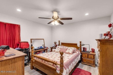 This 3 bed, 2 bath home built in 2023 is just a baby which means on Diamondhead Country Club in Mississippi - for sale on GolfHomes.com, golf home, golf lot