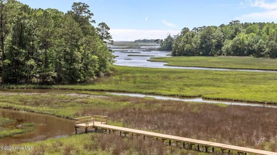 Coastal living at its finest with this exceptionally renovated on Olde Point Golf and Country Club in North Carolina - for sale on GolfHomes.com, golf home, golf lot