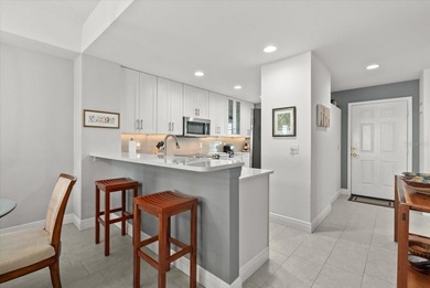 The first floor condo that is totally updated beautifully is now on Sabal Trace Golf and Country Club in Florida - for sale on GolfHomes.com, golf home, golf lot