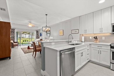 The first floor condo that is totally updated beautifully is now on Sabal Trace Golf and Country Club in Florida - for sale on GolfHomes.com, golf home, golf lot