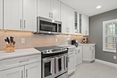 The first floor condo that is totally updated beautifully is now on Sabal Trace Golf and Country Club in Florida - for sale on GolfHomes.com, golf home, golf lot