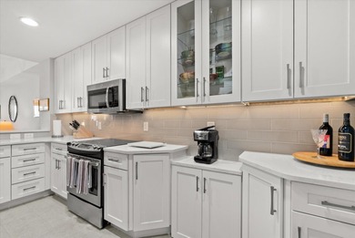 The first floor condo that is totally updated beautifully is now on Sabal Trace Golf and Country Club in Florida - for sale on GolfHomes.com, golf home, golf lot