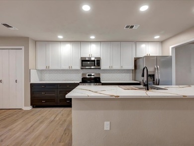 Welcome to this stylishly renovated 2 bed, 2.5 bath townhome in on Crown Colony Country Club in Texas - for sale on GolfHomes.com, golf home, golf lot