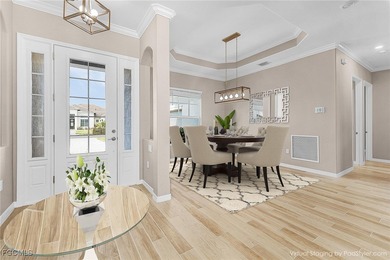 Welcome Home! Step into this beautifully designed Napoli Grande on Heritage Landing Golf  in Florida - for sale on GolfHomes.com, golf home, golf lot