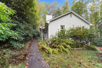 Move-in ready and fully furnished, this charming single-level on Sapphire National Golf Club in North Carolina - for sale on GolfHomes.com, golf home, golf lot