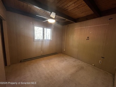 Large Chalet home in the Hideout, house features 4-bedrooms, 3 on The Hideout Golf in Pennsylvania - for sale on GolfHomes.com, golf home, golf lot