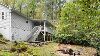 Move-in ready and fully furnished, this charming single-level on Sapphire National Golf Club in North Carolina - for sale on GolfHomes.com, golf home, golf lot
