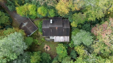 Move-in ready and fully furnished, this charming single-level on Sapphire National Golf Club in North Carolina - for sale on GolfHomes.com, golf home, golf lot