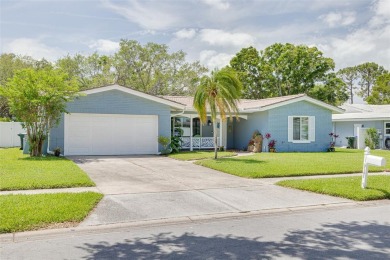 Under contract-accepting backup offers. Welcome to your on The Dunedin Country Club in Florida - for sale on GolfHomes.com, golf home, golf lot