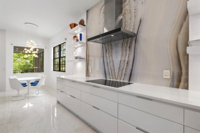 Live the ultimate country club lifestyle in this exquisitely on Parkland Golf Club in Florida - for sale on GolfHomes.com, golf home, golf lot