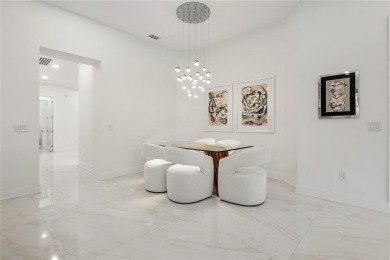 Live the ultimate country club lifestyle in this exquisitely on Parkland Golf Club in Florida - for sale on GolfHomes.com, golf home, golf lot