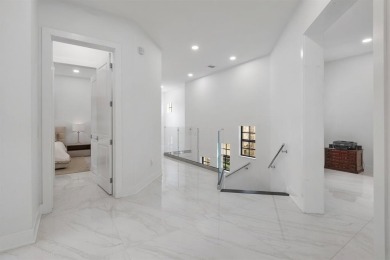 Live the ultimate country club lifestyle in this exquisitely on Parkland Golf Club in Florida - for sale on GolfHomes.com, golf home, golf lot