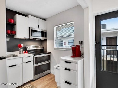 Remodeled 2 bedroom, 2 bath second floor condo offering 910 on Daytona Beach Golf Club in Florida - for sale on GolfHomes.com, golf home, golf lot