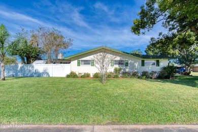 Beautiful corner-lot home in the sought after Fairway Estates on Daytona Beach Golf Club in Florida - for sale on GolfHomes.com, golf home, golf lot