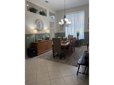 This exceptionally clean home features a newer 2023 heated on The Legacy Golf and Tennis Club in Florida - for sale on GolfHomes.com, golf home, golf lot