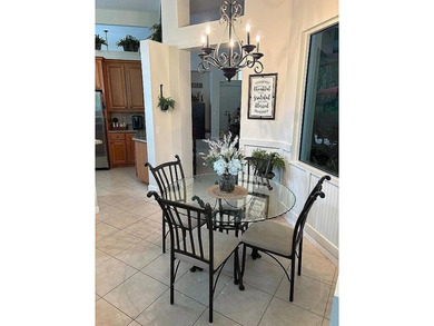 This exceptionally clean home features a newer 2023 heated on The Legacy Golf and Tennis Club in Florida - for sale on GolfHomes.com, golf home, golf lot
