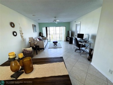 Cozy 2-bedroom, 2-bathroom apartment in a unique location close on Crystal Lake Country Club in Florida - for sale on GolfHomes.com, golf home, golf lot