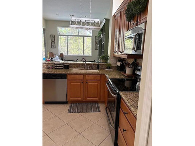 This exceptionally clean home features a newer 2023 heated on The Legacy Golf and Tennis Club in Florida - for sale on GolfHomes.com, golf home, golf lot